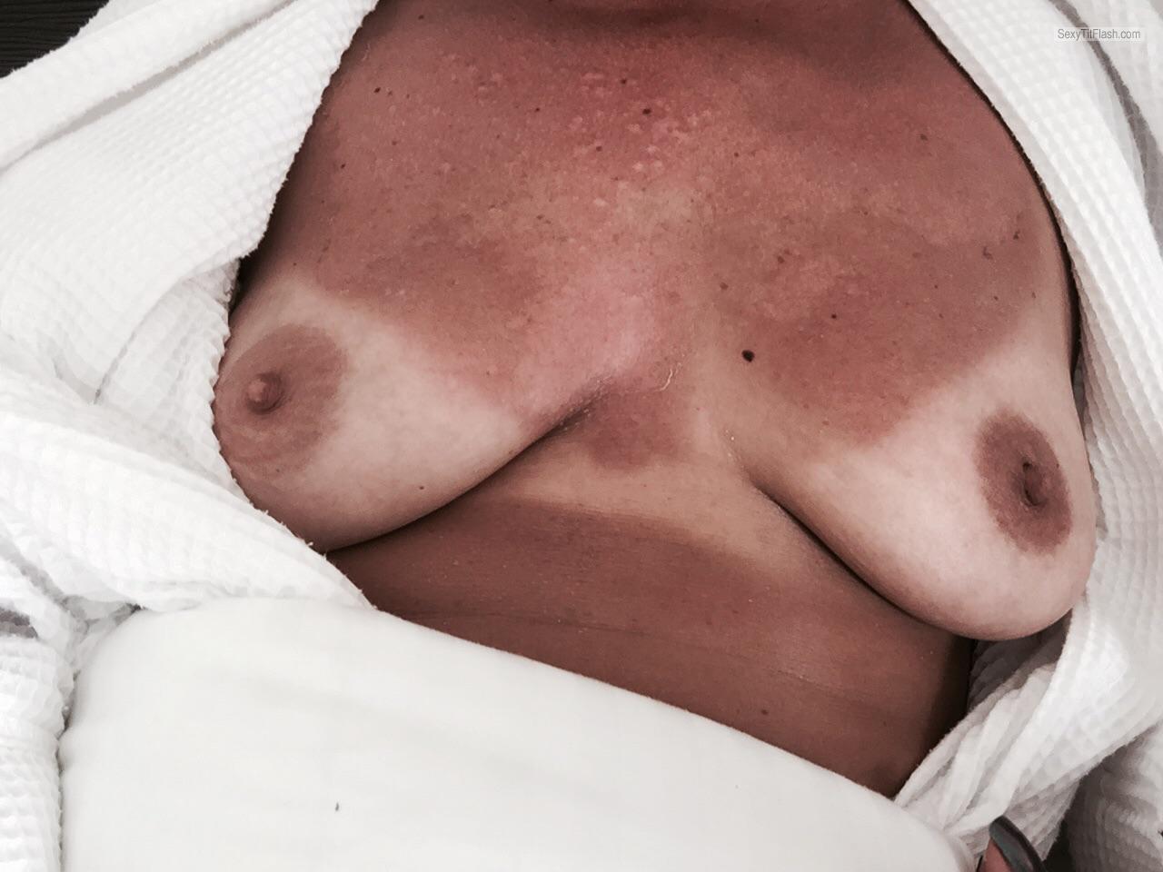 Tit Flash: My Medium Tits With Strong Tanlines - E V from United States